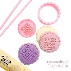 May include: A set of pink plastic biscuit tools including a scalloped circular cutter, two thin sticks, and two circular stamps. One stamp is pink with the text EVER ROSE IMPRESSIONS, and the other is purple with the text YOUR LOGO HERE.