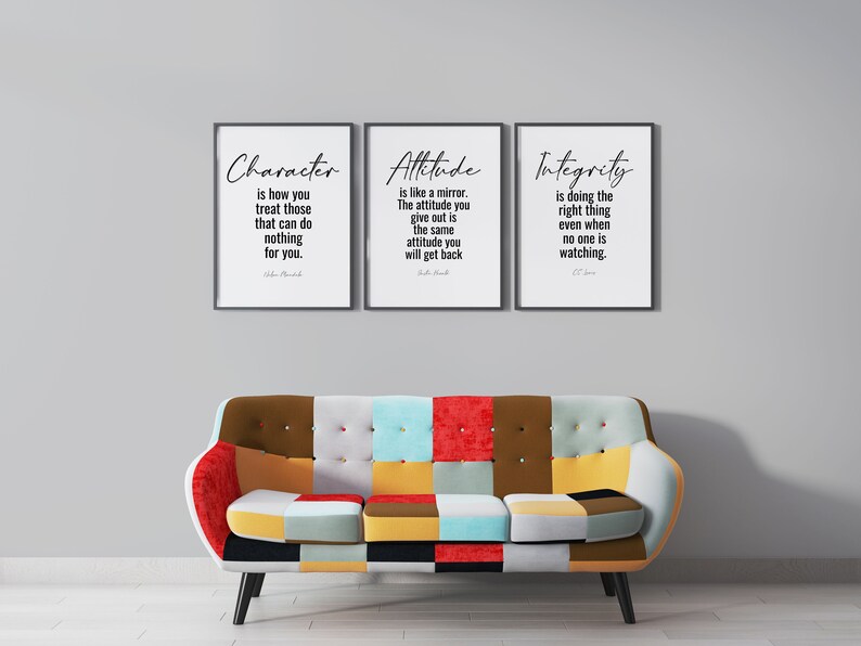 May include: Three framed inspirational quotes on a white wall. The quotes are "Character is how you treat those that can do nothing for you." by John Maxwell, "Attitude is like a mirror. The attitude you give out is the same attitude you will get back." by John Maxwell, and "Integrity is doing the right thing even when no one is watching." by C.S. Lewis.