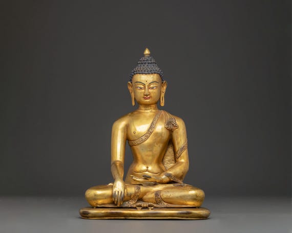 釈迦牟尼仏像：仏教の開祖 | ゴータマ・ブッダの黄金彫刻 | 力と知恵