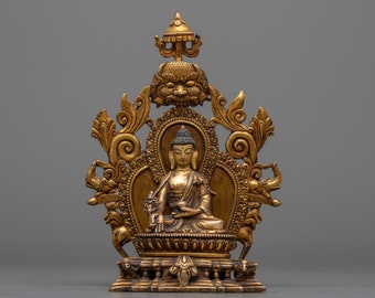 Embrace Divine Healing with Our Antique-Finished Medicine Buddha Statue – A Harmonious Blend of Gold, Acrylic, and Compassionate Blessings