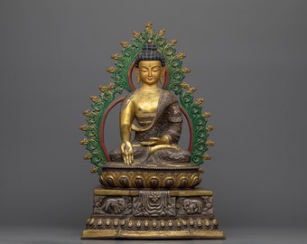 Boeddhabeeld Ratnasambhava - traditioneel gemaakte boeddhistische sculptuur, spirituele welvaart, vrijgevigheidssymbool, handgemaakte boeddhistische kunstwerken