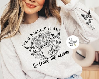 Sudadera con cuello redondo y estampado de mariposa y seta - Déjame en paz