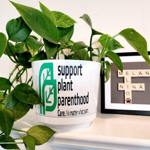 Support plant parenthood planter