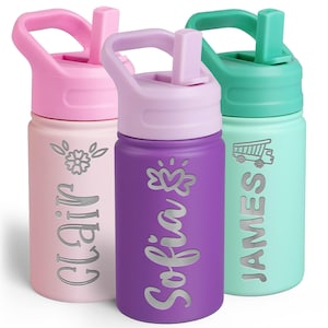 May include: Three cylindrical water bottles with straw lids. The light pink bottle features a flower icon and the name Clair. The purple bottle features a heart icon and the name Sofia. The mint green bottle features a truck icon and the name James.