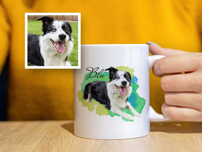 May include: White ceramic mug featuring a watercolour illustration of a black and white border collie dog with blue eyes. The dog's name "Blu" is written in cursive on the mug.