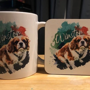May include: White ceramic mug and coaster set with a watercolour design featuring a brown and white dog with the name "Winston" printed on both items.