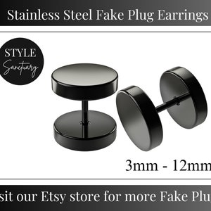 May include: A pair of black stainless steel fake plug earrings. The earrings are 3mm to 12mm in size.  "STYLE Sanctuary" is written in white on a black circle.