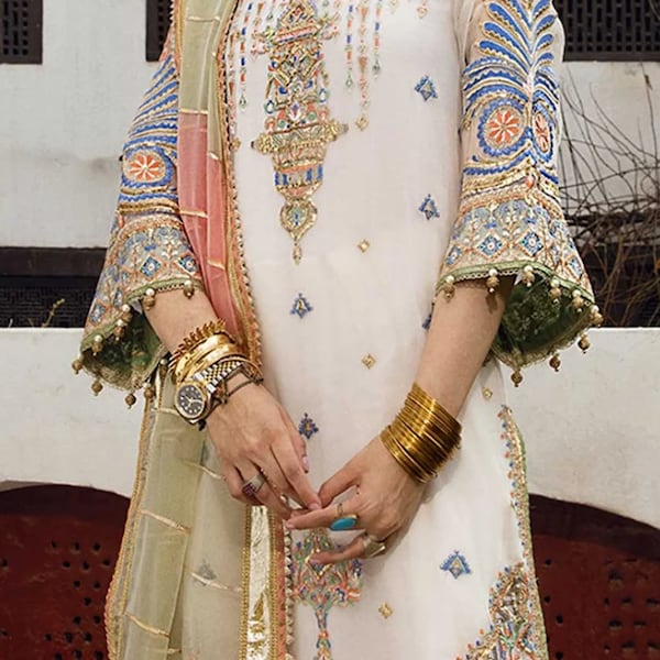 Pakistani designer organza embroidery ethnic stylish party wear made on custom order.