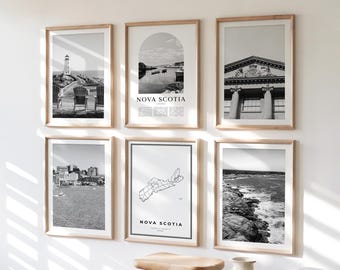 May include: A collection of six framed black and white prints. The prints depict various scenes, including a lighthouse, a coastal landscape, and architectural details. One print features the text "NOVA SCOTIA".