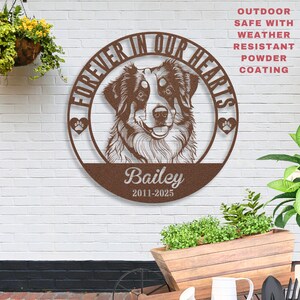 May include: A brown metal sign with a dog portrait, the text "FOREVER IN OUR HEARTS", and the name "Bailey" with dates. The sign has paw prints and is designed for outdoor use with weather-resistant powder coating.