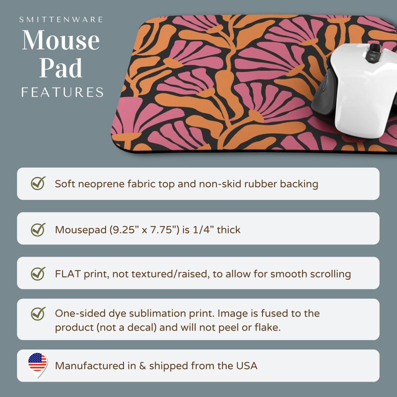 May include: A mouse pad featuring a floral design in shades of pink and orange on a black background. The mouse pad measures 9.25 inches by 7.75 inches and is 1/4 inch thick. It is made from soft neoprene fabric with a non-slip rubber backing. The mouse pad has a flat surface, not textured, for smooth scrolling. The image is fused to the product and won't peel or flake. It is manufactured and shipped from the USA.