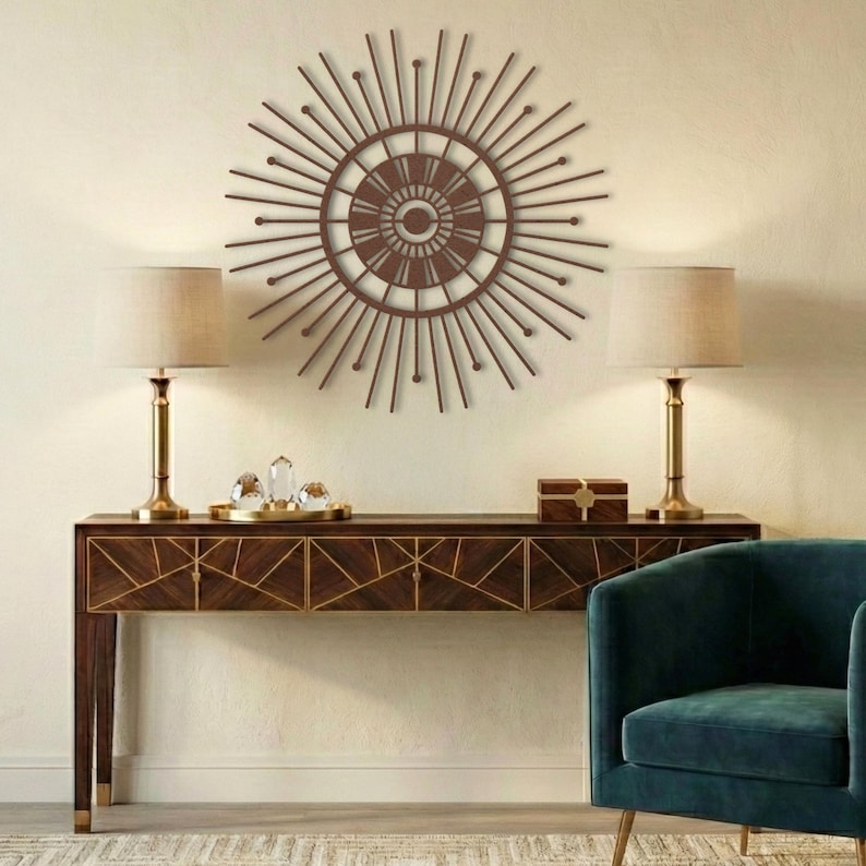 Copper finished mid century modern sun wall piece hanging above a wooden credenza.