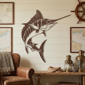 Rustic copper patina swordfish sculpture mounted on white shiplap wall next to nautical maps and ship wheel.