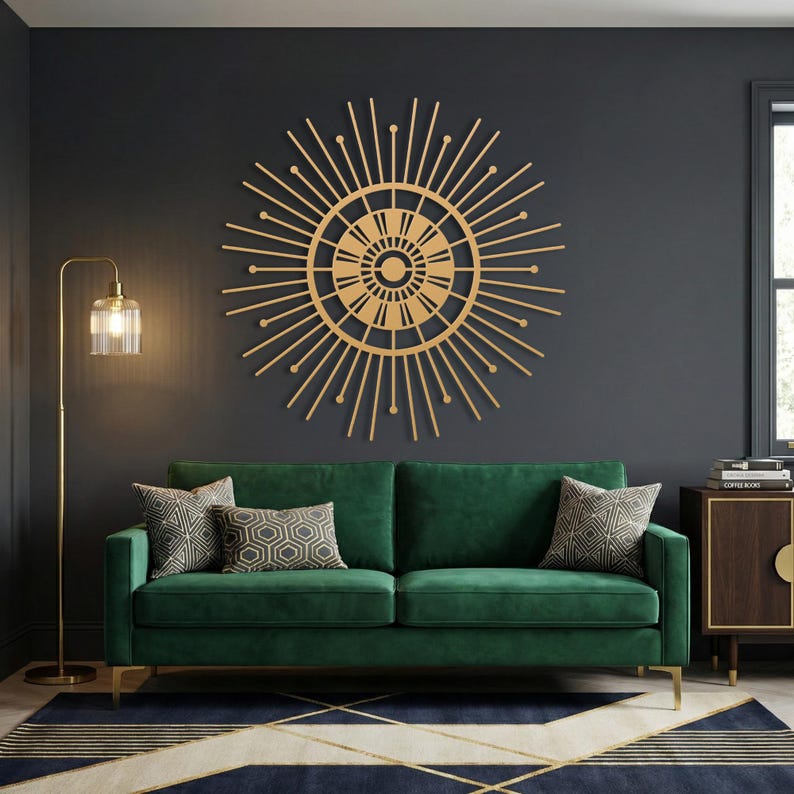 Gold art deco sunburst metal wall art, mid century modern starburst decor over green velvet couch in dark living room.