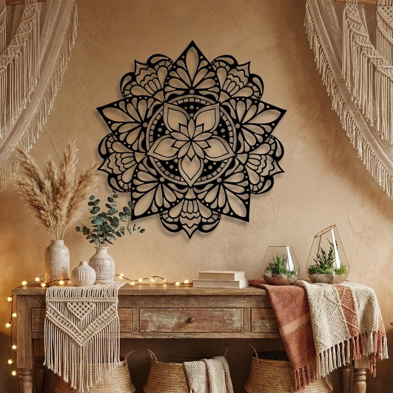 Black metal mandala wall art, boho eclectic living room decor with dried pampas grass.