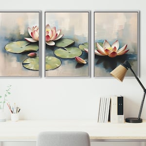 May include: Triptych of framed art prints featuring watercolor paintings of lotus flowers. Each panel depicts a different composition of the flowers, with pink and white petals, green lily pads, and a serene water background.