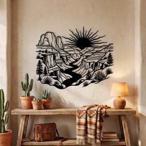 Black silhouette metal art of Zion Canyon landscape with sunburst on beige wall, modern hiking decor.
