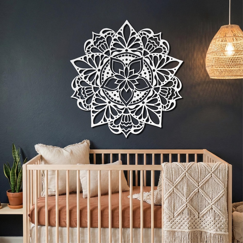 White floral mandala wall hanging, boho nursery decor above crib.