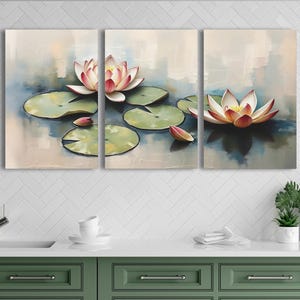 May include: A triptych canvas art print featuring a serene water lily pond scene. The artwork showcases three panels with impressionistic paintings of pink and white water lilies, green lily pads, and soft blue water.