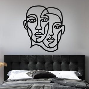 Black couple line art, romantic bedroom wall decor above bed.