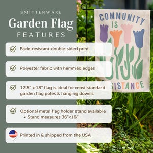 May include: A white garden flag with colourful flowers and the text "COMMUNITY IS RESISTANCE". The flag is 12.5 inches by 18 inches and is made of polyester fabric with hemmed edges. The flag is fade-resistant and double-sided.