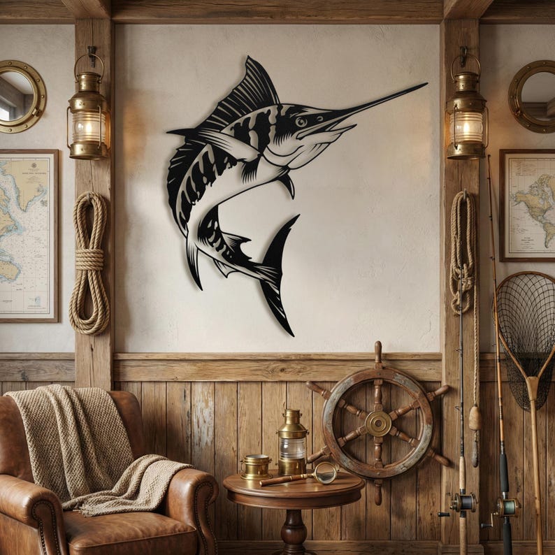 Black marlin silhouette sign hanging above a leather chair styled with vintage fishing rods and nets.