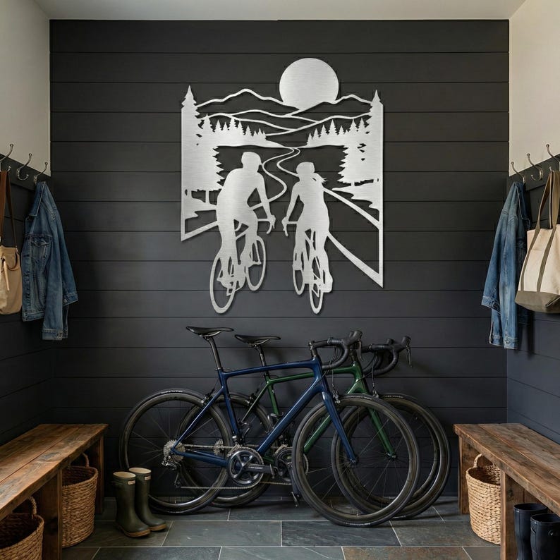 Silver road biking metal art, cycling couple decor in modern mudroom above bicycles