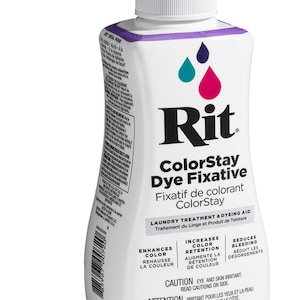 Könnte beinhalten: Eine weiße Plastikflasche mit Rit ColorStay Farbfixierer. Die Flasche ist mit dem Rit-Logo und dem Produktnamen beschriftet. Die Flasche enthält 236 ml (8,0 fl. oz).