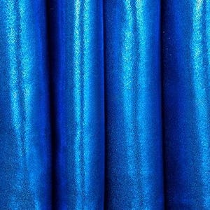 May include: Close-up of a blue metallic fabric with a smooth, shiny texture. The fabric is folded and draped, creating a soft, flowing effect.