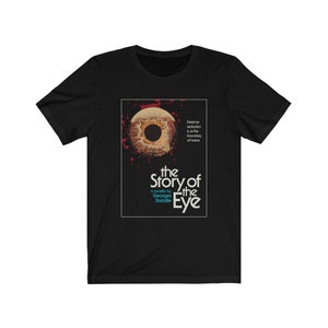 May include: Black t-shirt with a graphic of a large eye and the text "the Story of the Eye" a novella by Georges Bataille.
