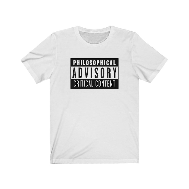 May include: White t-shirt with a black graphic that says "Philosophical Advisory Critical Content".
