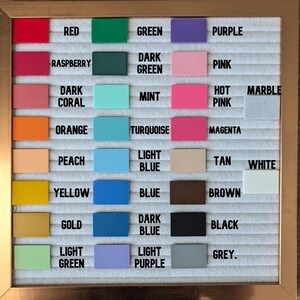 May include: A color chart with 20 different colors, including red, green, purple, pink, orange, yellow, blue, brown, black, white, and grey. The colors are arranged in rows and columns on a white background.