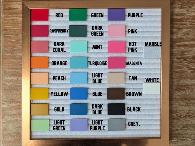 May include: A color chart with 20 different colors, including red, green, purple, pink, orange, yellow, blue, brown, black, white, and grey. The colors are arranged in rows and columns on a white background.