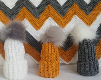 Beautiful, stylish and modern handmade blanket and pom pom hat