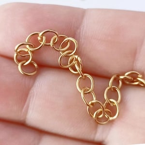 100 Pcs Gold Tone Stainless Steel Oval Jump Ring Strip - Tarnish Resistant 5mm (0.8mm Wire) Waterproof & Hypoallergenic Making Supplies