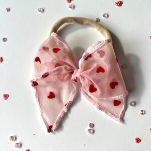 Babyhug Sleeveless 3D Flowers with Pearl and Bow Waist Belt - Pink
