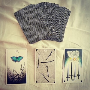 Tirada general de tarot de tres cartas