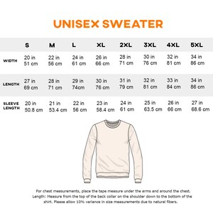 May include: A diagram showing the measurements for a unisex sweater in sizes S to 5XL. The width ranges from 20 inches (51 cm) to 34 inches (86 cm), length from 27 inches (69 cm) to 34 inches (86 cm), and sleeve length from 20 inches (50.8 cm) to 27 inches (68.6 cm).