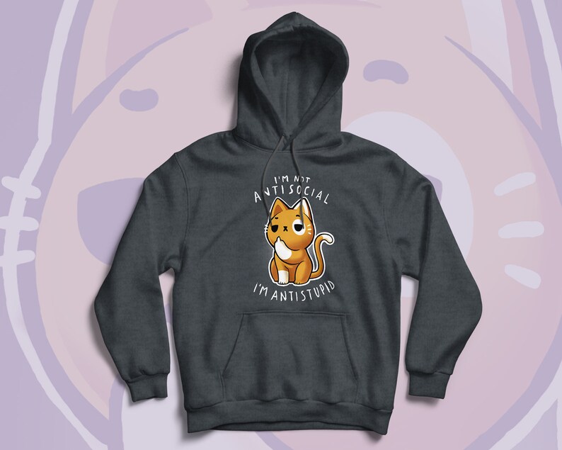 May include: Dark gray hoodie featuring a cartoon cat with the text "I'M NOT ANTISOCIAL I'M ANTISTUPID". The cat is orange and white with a sad expression. The hoodie has a drawstring hood and a kangaroo pocket.