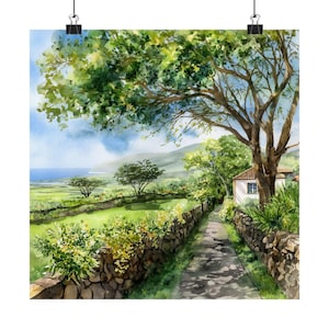 May include: Watercolor painting of a scenic landscape featuring a stone-lined path leading to a white house. Lush green trees and fields, a blue sky, and a distant ocean create a serene atmosphere. The artwork is attached to a black clip.