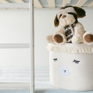 Makes a great baby shower gift basket. Nursery toy storage basket made of soft cotton rope. Nursery Laundry basket with cute animal face.