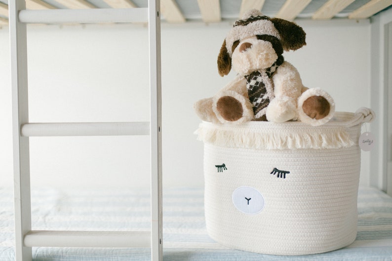 Makes a great baby shower gift basket. Nursery toy storage basket made of soft cotton rope. Nursery Laundry basket with cute animal face.
