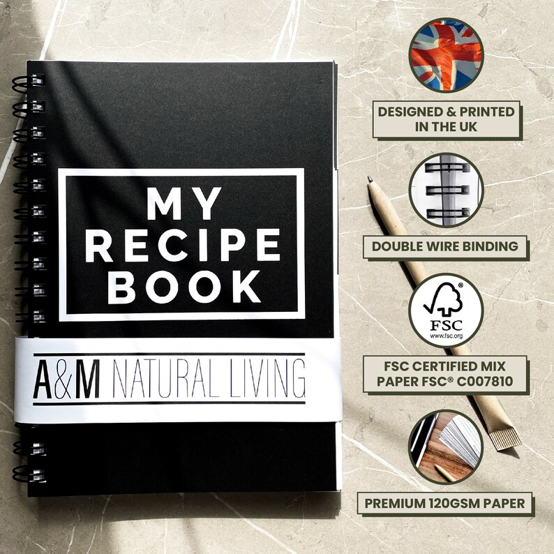 May include: Black recipe book with white text that reads "My Recipe Book" and "A&M Natural Living". The book has a double wire binding and is made with FSC certified paper.