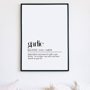 May include: Black and white printable wall art with the definition of garlic. The text reads "garlic [gaa-luhk] noun english Ingredient measured with your heart. No recipe can tell you how much to put in."