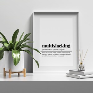 May include: A black and white printable wall art print with the definition of the word "multislacking". The definition is: "doing two or more useless activities simultaneously instead of working, the practice of using a computer at work for tasks not related to one's job."