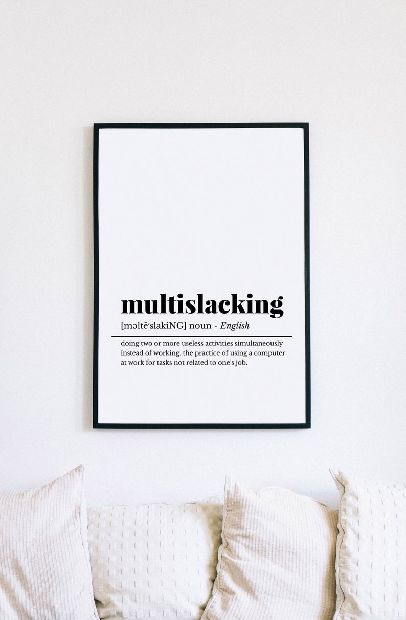 May include: A black and white printable wall art print with the definition of the word "multislacking". The definition is: "doing two or more useless activities simultaneously instead of working. the practice of using a computer at work for tasks not related to one's job."