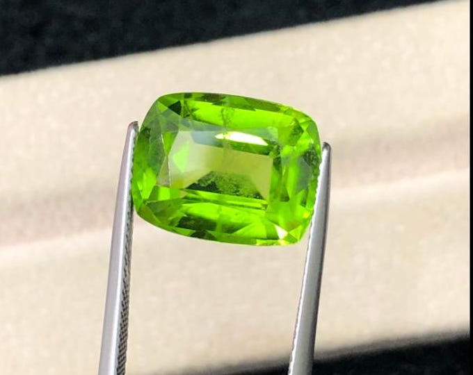 Lab Certified, Apple Green Color, Collector Size, 9.01 Carat, Cushion Cut Peridot