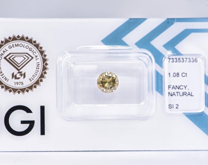 IGI Lab Certified, Natural, Untreated, 1.08 Carat, Brilliant Round Cut, SI2 Clarity, Yellow Diamond