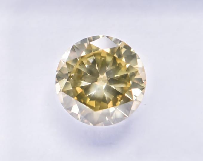 IGI Lab Certified, Natural, Untreated, 1.07 Carat, Brilliant Round Cut, SI2 Clarity, Green/Yellow Diamond