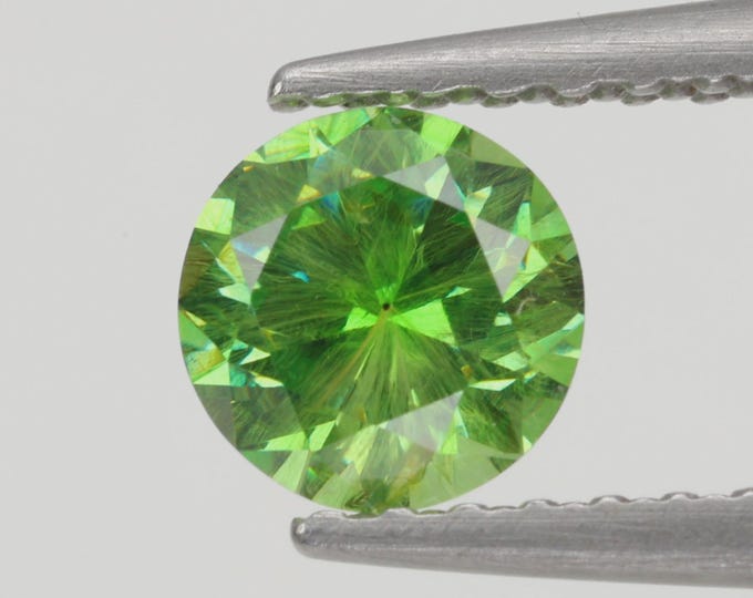 Lab-Certified, Russian Origin, .53 Carat, Round Cut, Demantoid Garnet with RARE Starburst Horsetail Inclusions